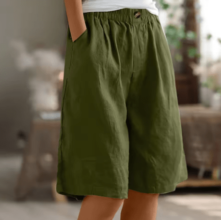 Womens shorts with elastic waistband in breathable fabric, mid-thigh length design for all-day comfort and versatility. 0