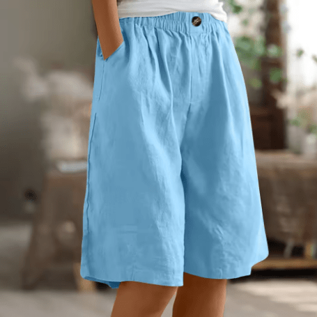 Womens shorts with elastic waistband in breathable fabric, mid-thigh length design for all-day comfort and versatility. 6