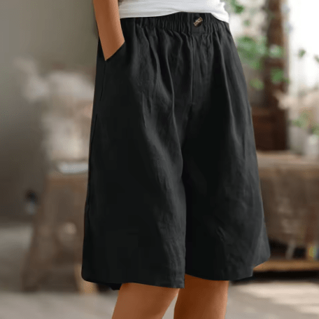 Womens shorts with elastic waistband in breathable fabric, mid-thigh length design for all-day comfort and versatility. 12