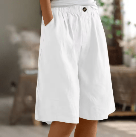 Womens shorts with elastic waistband in breathable fabric, mid-thigh length design for all-day comfort and versatility. 10