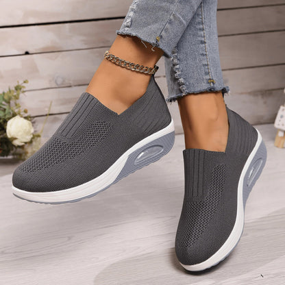 Women's slip-on sneakers in white, featuring a breathable design and flexible support, perfect for sporty minimalist style. 3