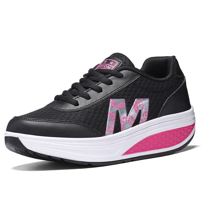 Women's sneakers featuring arch support and breathable fabric, designed for comfort and durability, perfect for walking and everyday wear. 0
