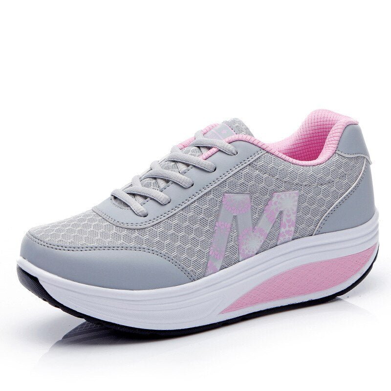 Women's sneakers featuring arch support and breathable fabric, designed for comfort and durability, perfect for walking and everyday wear. 3