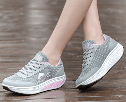 Women's sneakers featuring arch support and breathable fabric, designed for comfort and durability, perfect for walking and everyday wear. 5