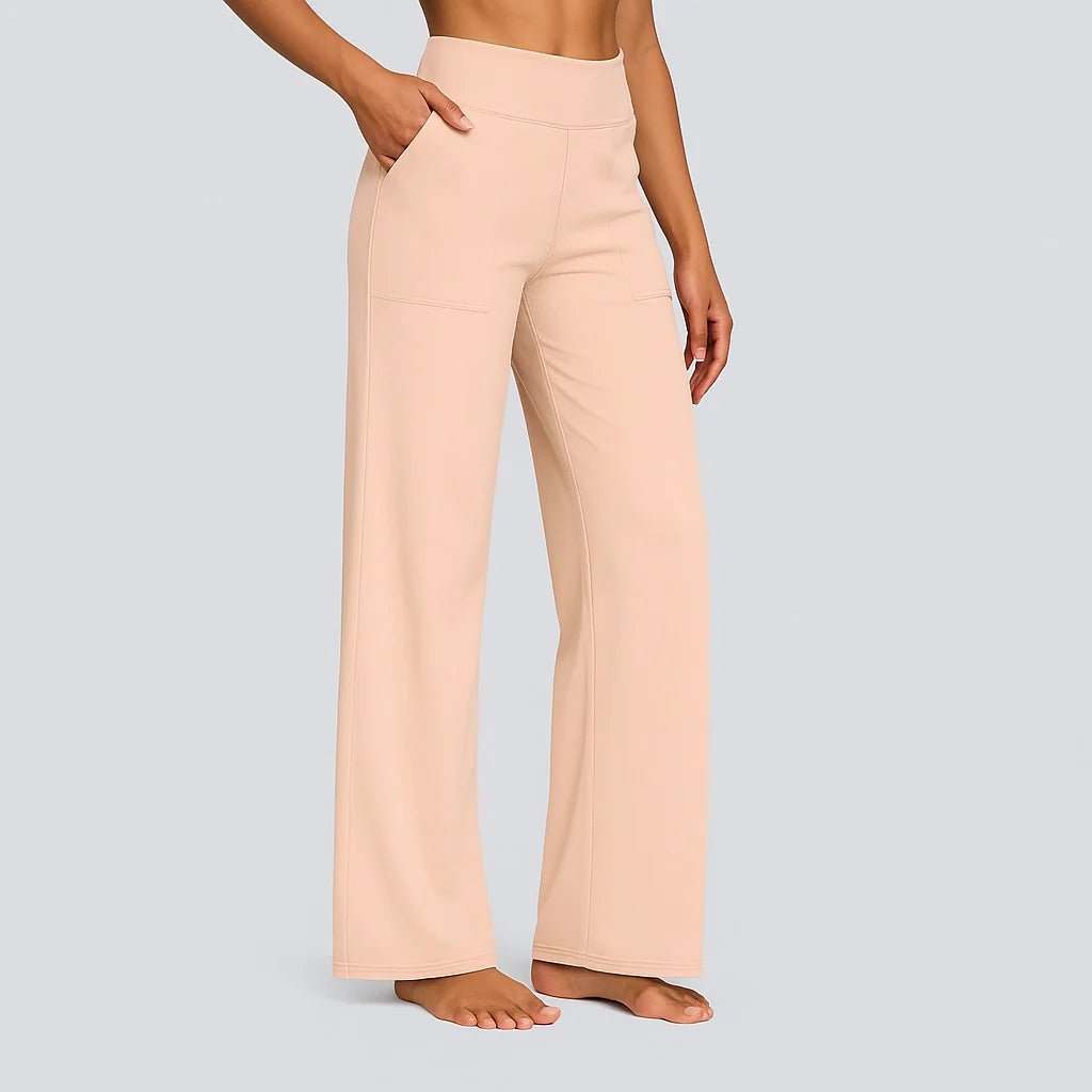 Women's stretch pants featuring a high waist design and deep pockets, crafted for comfort with wrinkle-free fabric, perfect for casual outings and workouts. 10