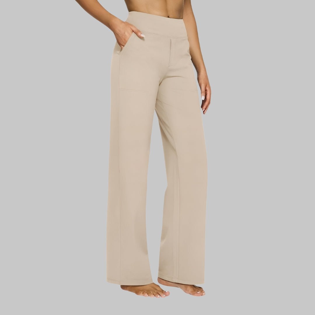Women's stretch pants featuring a high waist design and deep pockets, crafted for comfort with wrinkle-free fabric, perfect for casual outings and workouts. 4