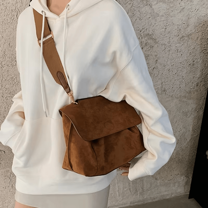 Elegant women's suede crossbody bag with adjustable strap, perfect for fall and winter, measuring 29cm x 14cm x 19cm. 2