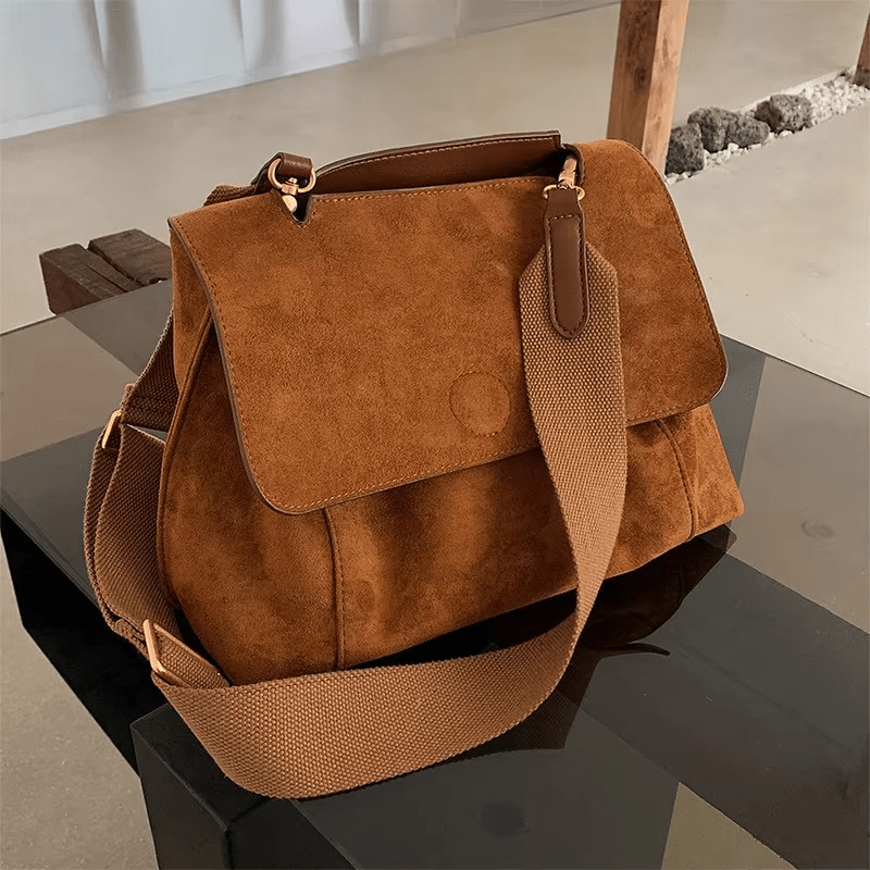 Elegant women's suede crossbody bag with adjustable strap, perfect for fall and winter, measuring 29cm x 14cm x 19cm. 0