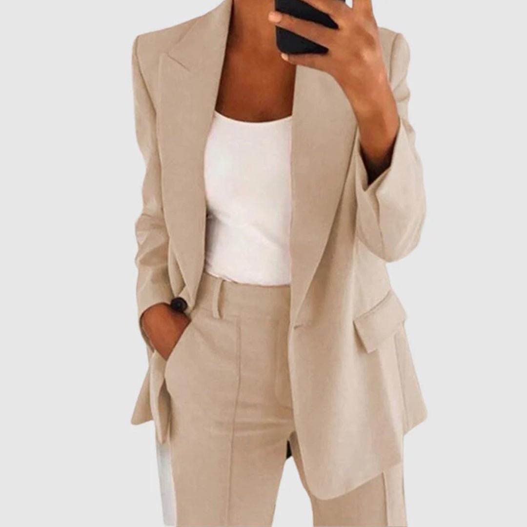 Women's elegant two-piece suit set featuring a stylish blazer and tailored trousers, perfect for both formal and casual occasions. 1