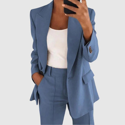 Women's elegant two-piece suit set featuring a stylish blazer and tailored trousers, perfect for both formal and casual occasions. 4