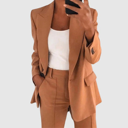 Women's elegant two-piece suit set featuring a stylish blazer and tailored trousers, perfect for both formal and casual occasions. 3