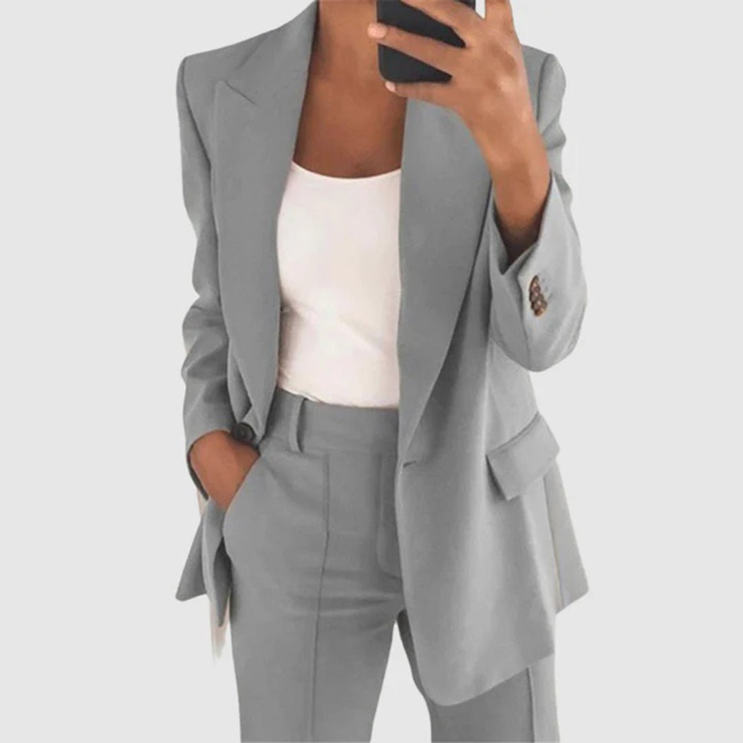 Women's elegant two-piece suit set featuring a stylish blazer and tailored trousers, perfect for both formal and casual occasions. 5
