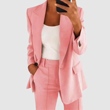 Women's elegant two-piece suit set featuring a stylish blazer and tailored trousers, perfect for both formal and casual occasions. 2