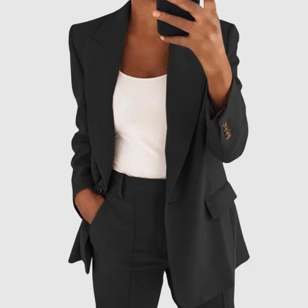 Women's elegant two-piece suit set featuring a stylish blazer and tailored trousers, perfect for both formal and casual occasions. 0