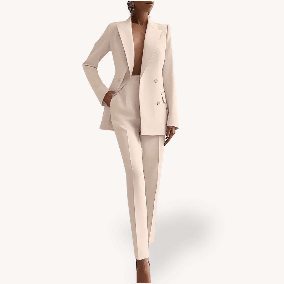 Elegant women's suit set featuring a long double-breasted blazer and slim pants, crafted from a luxurious wool blend, perfect for office and formal occasions. 1