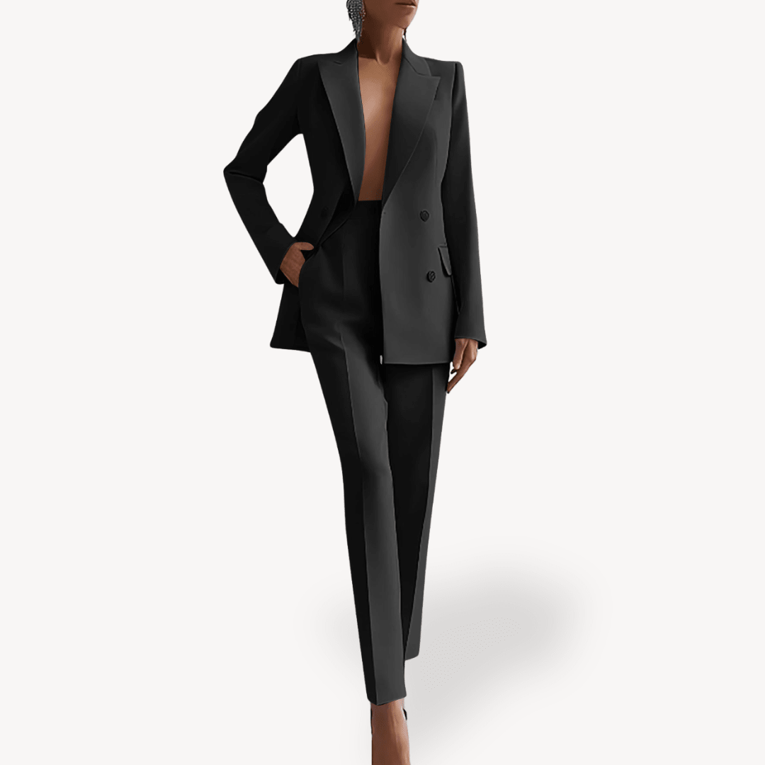 Elegant women's suit set featuring a long double-breasted blazer and slim pants, crafted from a luxurious wool blend, perfect for office and formal occasions. 0