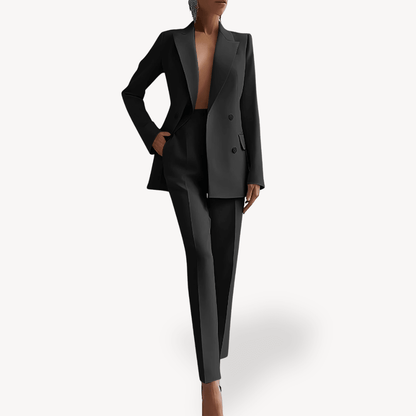 Elegant women's suit set featuring a long double-breasted blazer and slim pants, crafted from a luxurious wool blend, perfect for office and formal occasions. 0