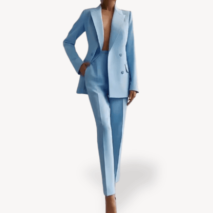 Elegant women's suit set featuring a long double-breasted blazer and slim pants, crafted from a luxurious wool blend, perfect for office and formal occasions. 3