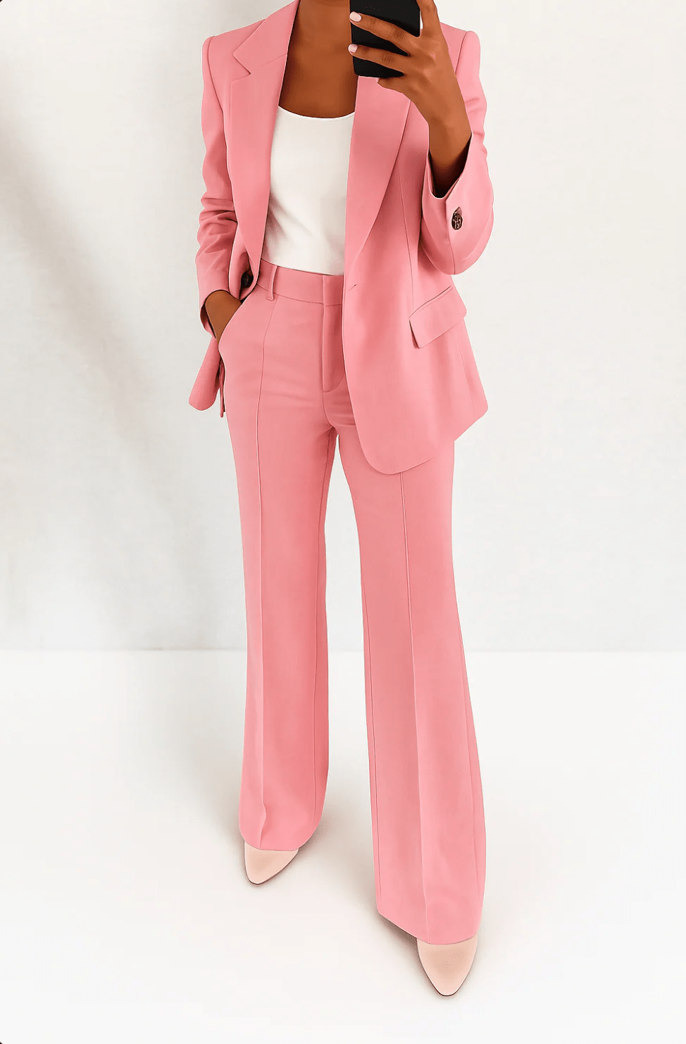 Women's two-piece suit set featuring a flattering fit, crafted from a versatile polyester blend, available in multiple colors, perfect for professional or casual occasions. 4