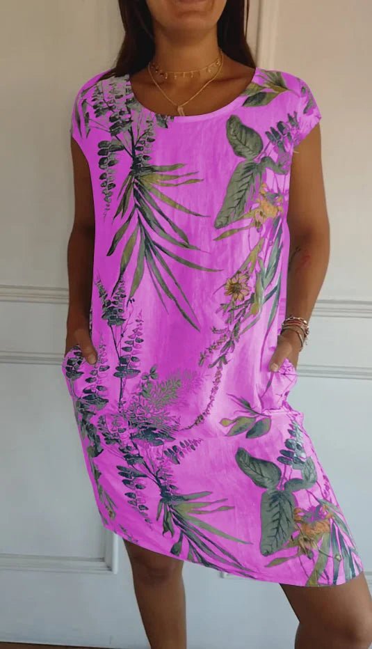 Women's summer dress featuring a vibrant botanical print, designed with convenient pockets, made from a lightweight cotton-linen blend for a relaxed fit, perfect for warm 4