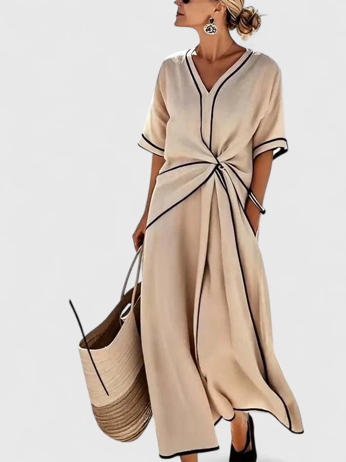 Womens summer dress featuring a lightweight breathable design and stylish vertical stripes, perfect for elegant casual outings. 1