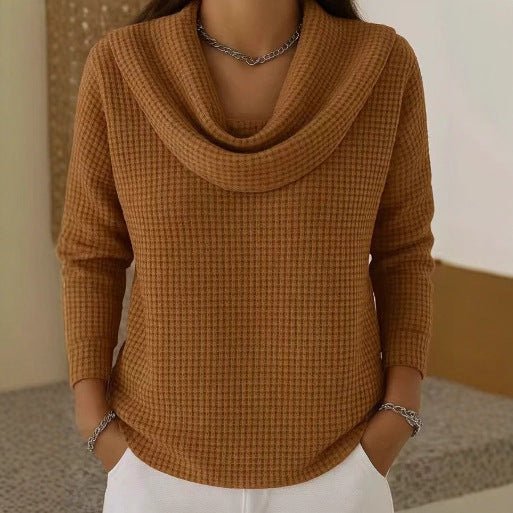 Women's blue sweater featuring a cowl neck design, made from soft waffle knit fabric for cozy warmth, with an elegant flowing fit perfect for stylish layering. 1