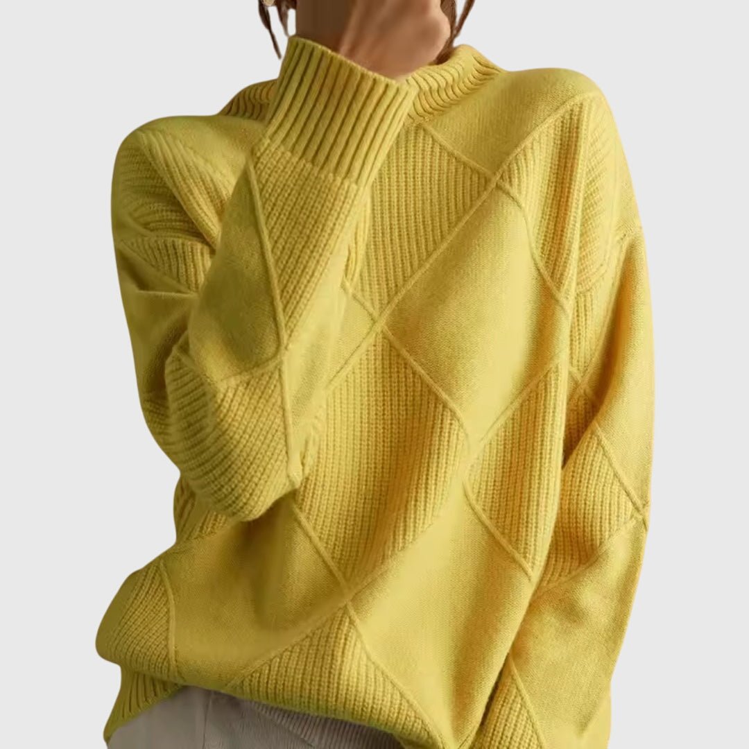Women’s rose-colored sweater featuring a stylish geometric pattern and a cozy turtleneck design, perfect for comfortable layering in cooler weather. 11