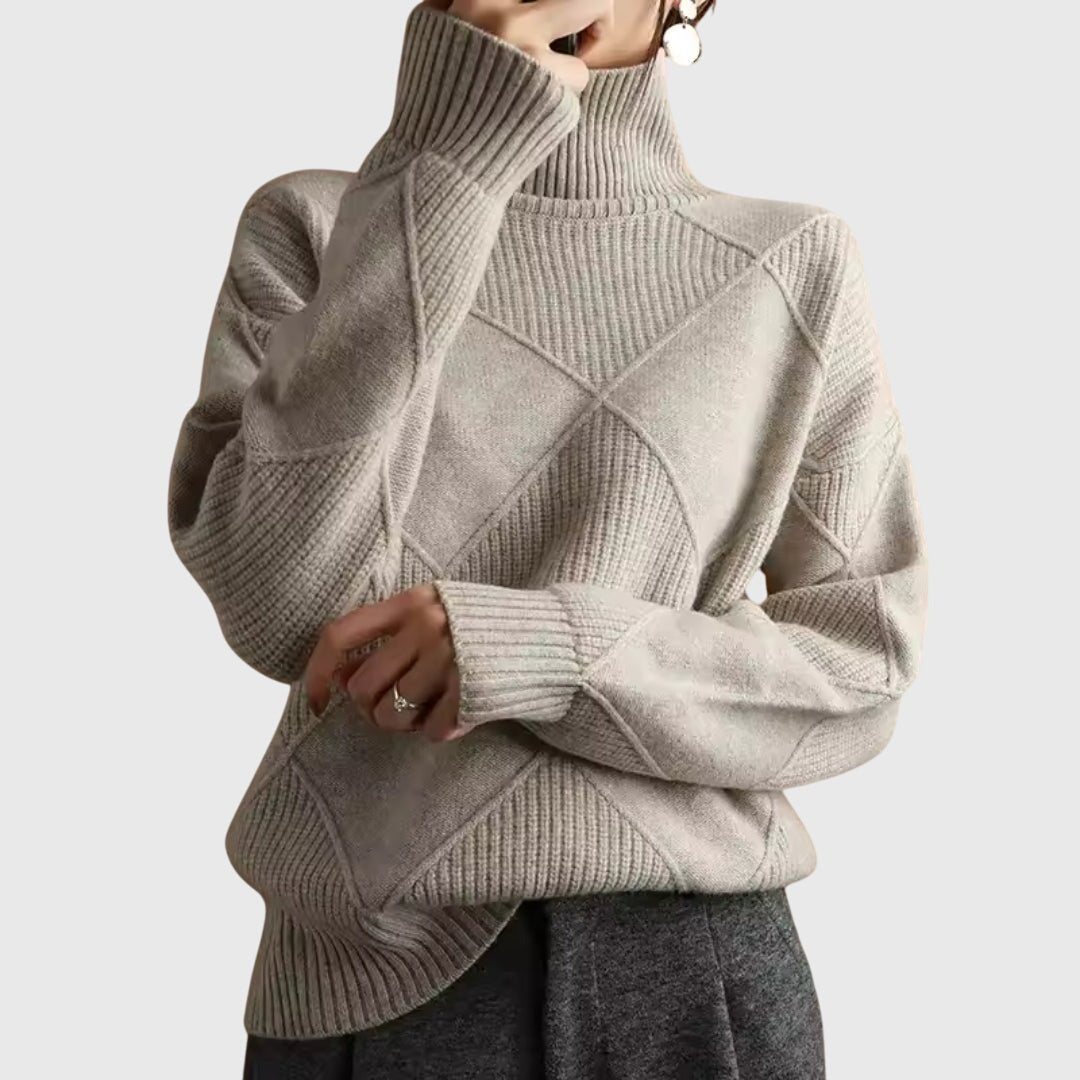 Women’s rose-colored sweater featuring a stylish geometric pattern and a cozy turtleneck design, perfect for comfortable layering in cooler weather. 9