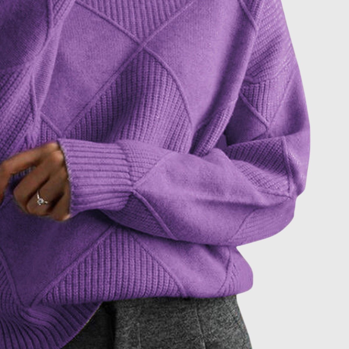 Women’s rose-colored sweater featuring a stylish geometric pattern and a cozy turtleneck design, perfect for comfortable layering in cooler weather. 5