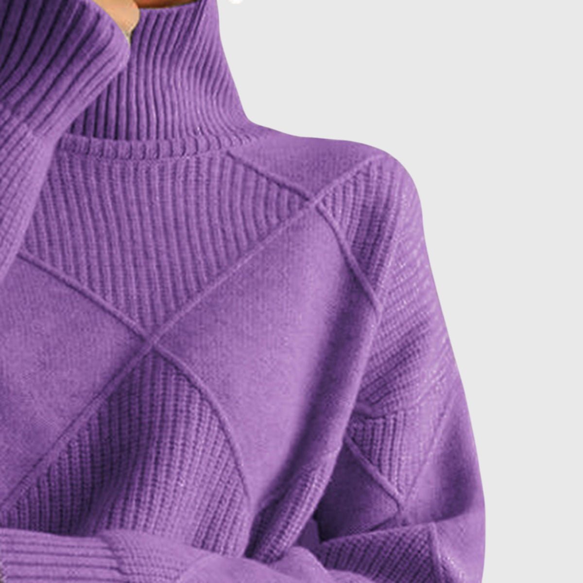 Women’s rose-colored sweater featuring a stylish geometric pattern and a cozy turtleneck design, perfect for comfortable layering in cooler weather. 4