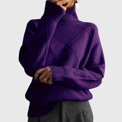 Women’s rose-colored sweater featuring a stylish geometric pattern and a cozy turtleneck design, perfect for comfortable layering in cooler weather. 12