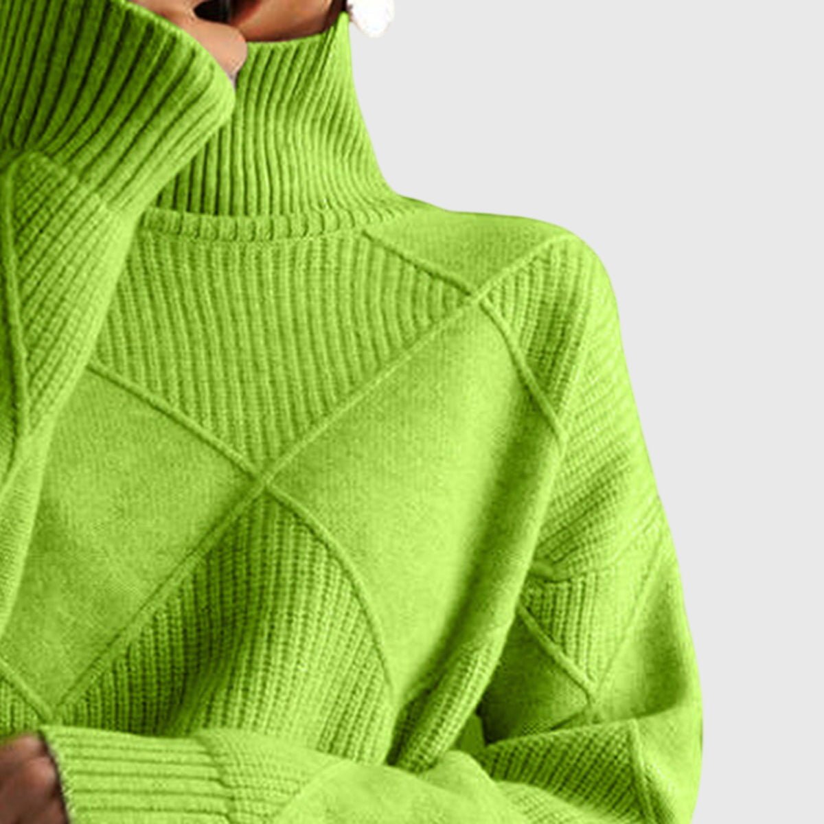 Women’s rose-colored sweater featuring a stylish geometric pattern and a cozy turtleneck design, perfect for comfortable layering in cooler weather. 8