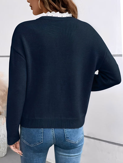 Elegant women's sweater featuring delicate lace detail and a classic cut, perfect for comfortable everyday wear. 2