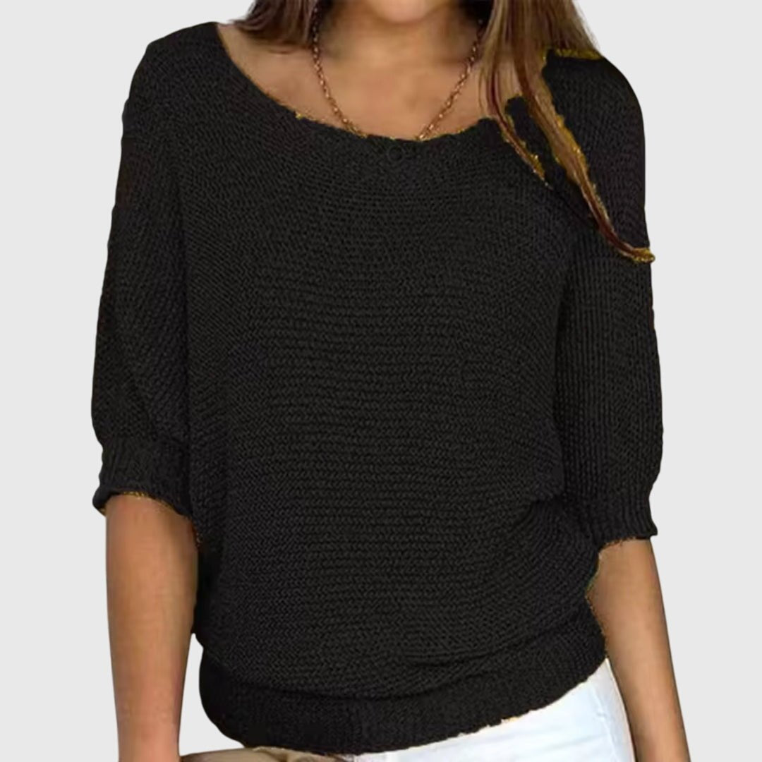 Women's beige sweater featuring a relaxed fit and soft smooth texture, perfect for versatile styling in any casual wardrobe. 2