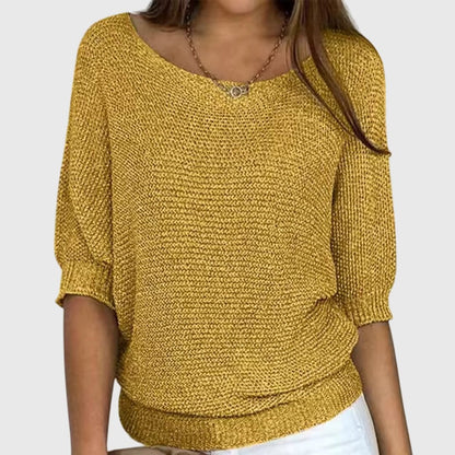 Women's beige sweater featuring a relaxed fit and soft smooth texture, perfect for versatile styling in any casual wardrobe. 4