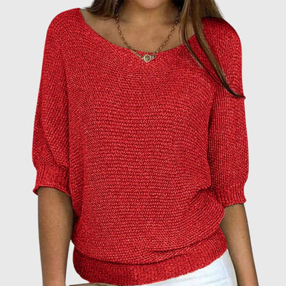 Women's beige sweater featuring a relaxed fit and soft smooth texture, perfect for versatile styling in any casual wardrobe. 1