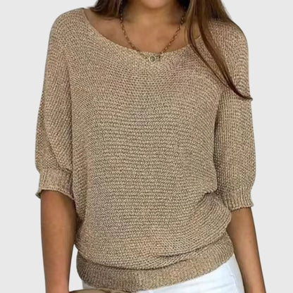 Women's beige sweater featuring a relaxed fit and soft smooth texture, perfect for versatile styling in any casual wardrobe. 0