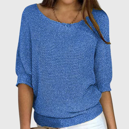 Women's beige sweater featuring a relaxed fit and soft smooth texture, perfect for versatile styling in any casual wardrobe. 3