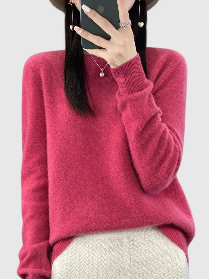 Women’s turquoise sweater featuring a relaxed fit and made from soft, warm material, perfect for cozy layering and versatile styling. 12