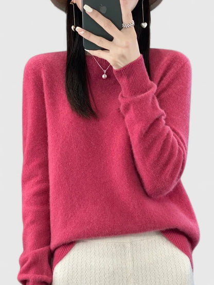 Women’s turquoise sweater featuring a relaxed fit and made from soft, warm material, perfect for cozy layering and versatile styling. 12