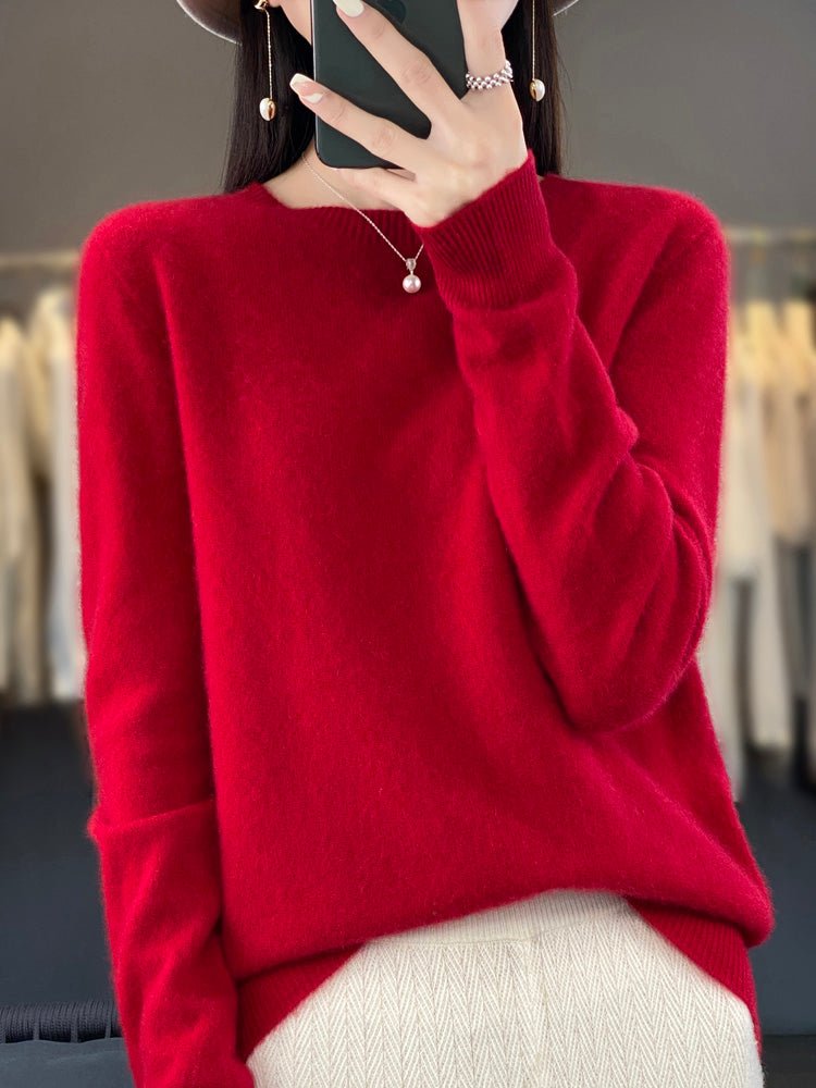 Women’s turquoise sweater featuring a relaxed fit and made from soft, warm material, perfect for cozy layering and versatile styling. 8