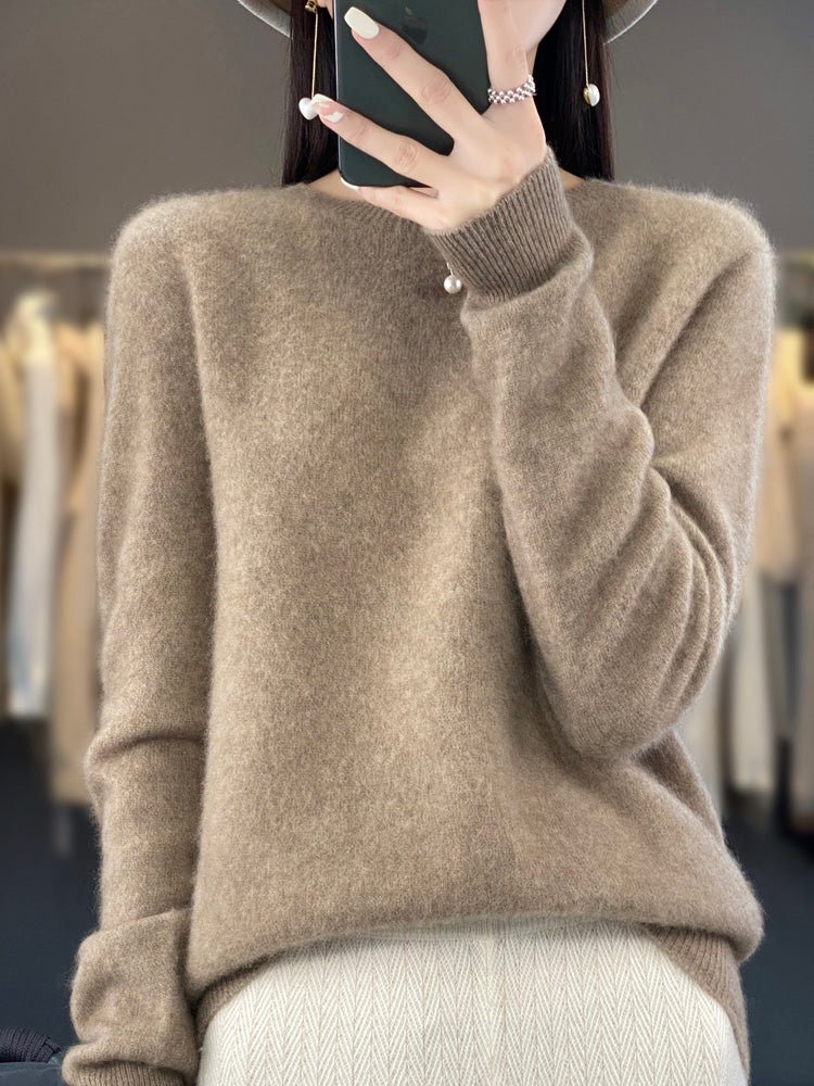 Women’s turquoise sweater featuring a relaxed fit and made from soft, warm material, perfect for cozy layering and versatile styling. 6
