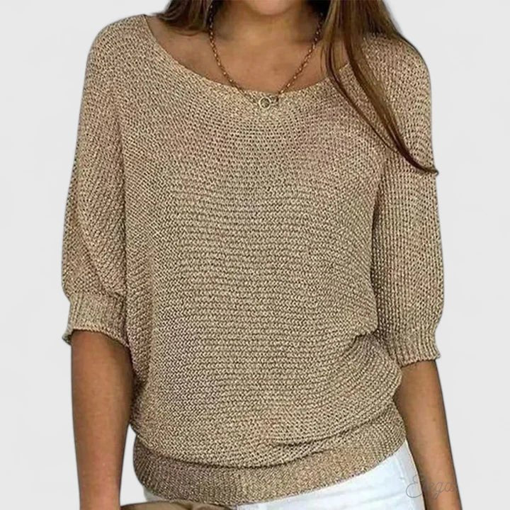 Women's green knit sweater featuring a soft and comfortable design, perfect for everyday wear with a timeless style. 1