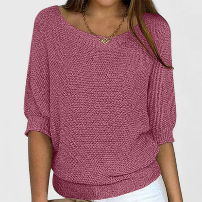 Women's green knit sweater featuring a soft and comfortable design, perfect for everyday wear with a timeless style. 2