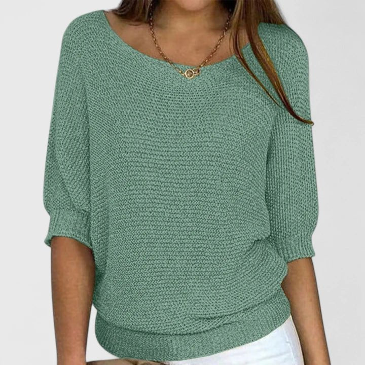 Women's green knit sweater featuring a soft and comfortable design, perfect for everyday wear with a timeless style. 0