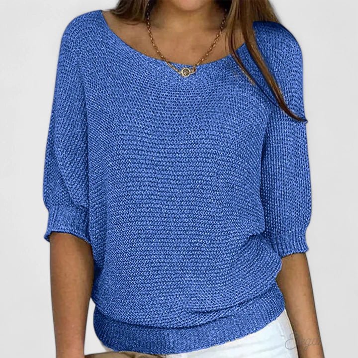 Women's green knit sweater featuring a soft and comfortable design, perfect for everyday wear with a timeless style. 3