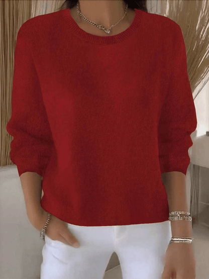 Women's yellow sweater featuring a soft and warm fabric, designed for cozy everyday wear with an elegant style. 9
