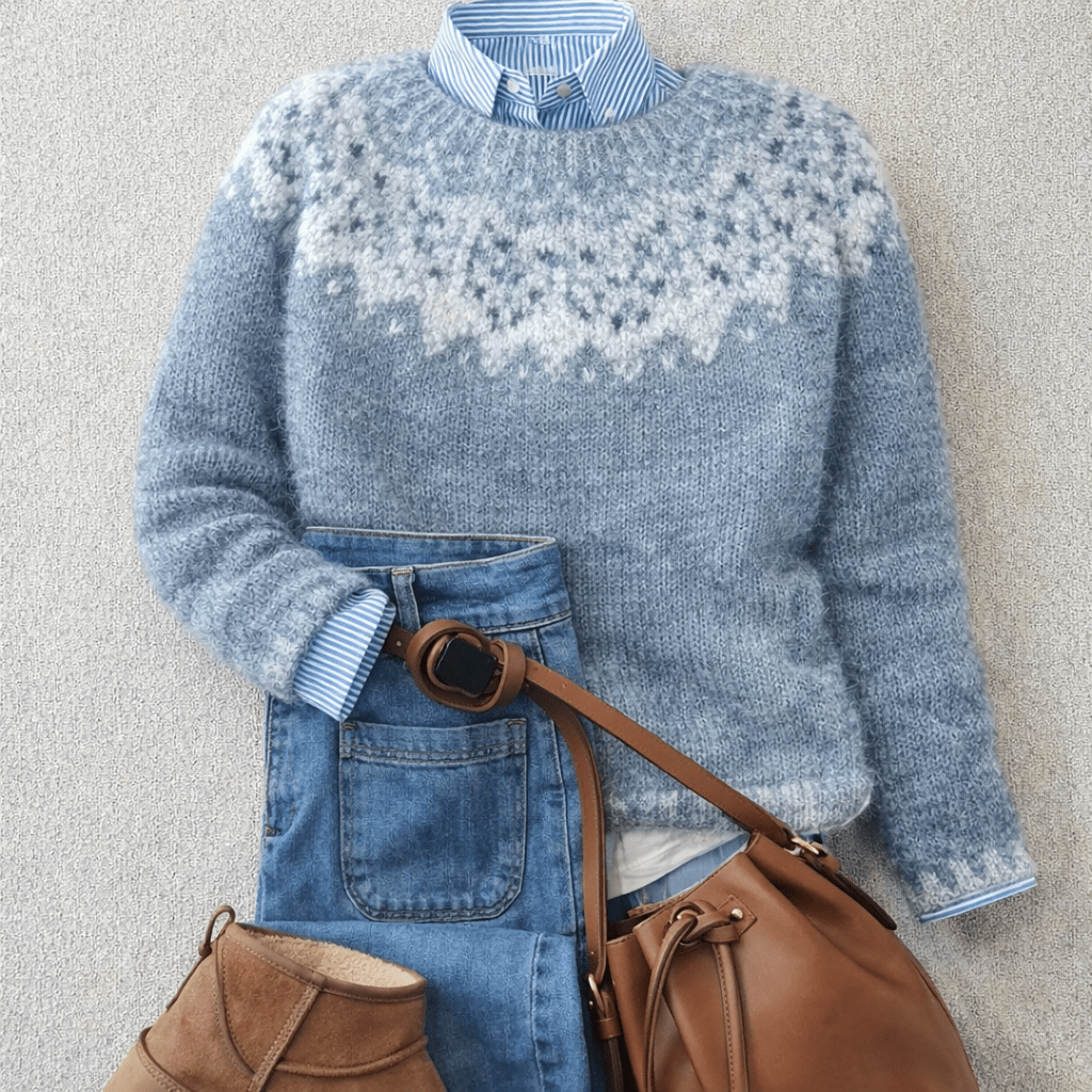 Women's ultra-soft knit sweater featuring a classic Nordic design, relaxed fit, and ribbed cuffs for ultimate comfort and style. 0