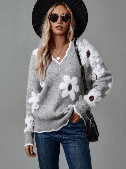 Womens V-neck sweater featuring floral accents, cozy knit design, perfect for casual and stylish outfits. 2