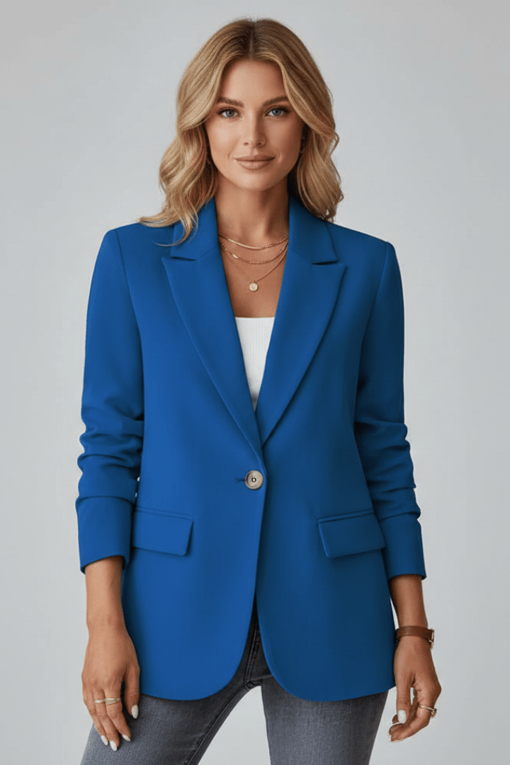 Women's tailored black blazer featuring a notched lapel and single button design, perfect for both professional and casual occasions. 6
